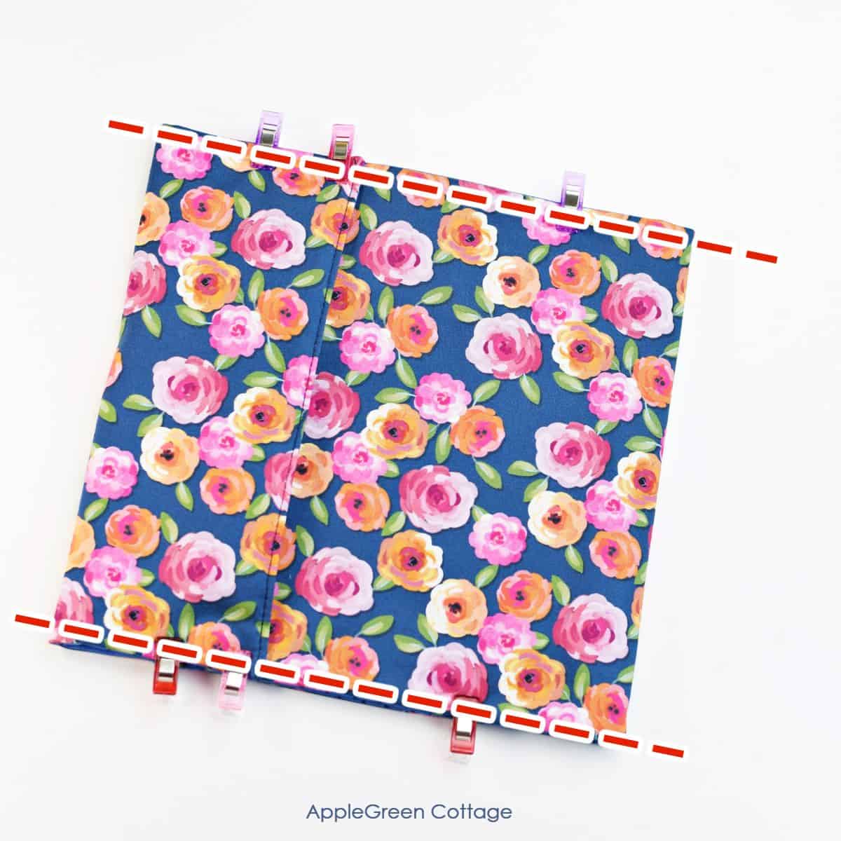 finishing stitches on a microwave potato bag