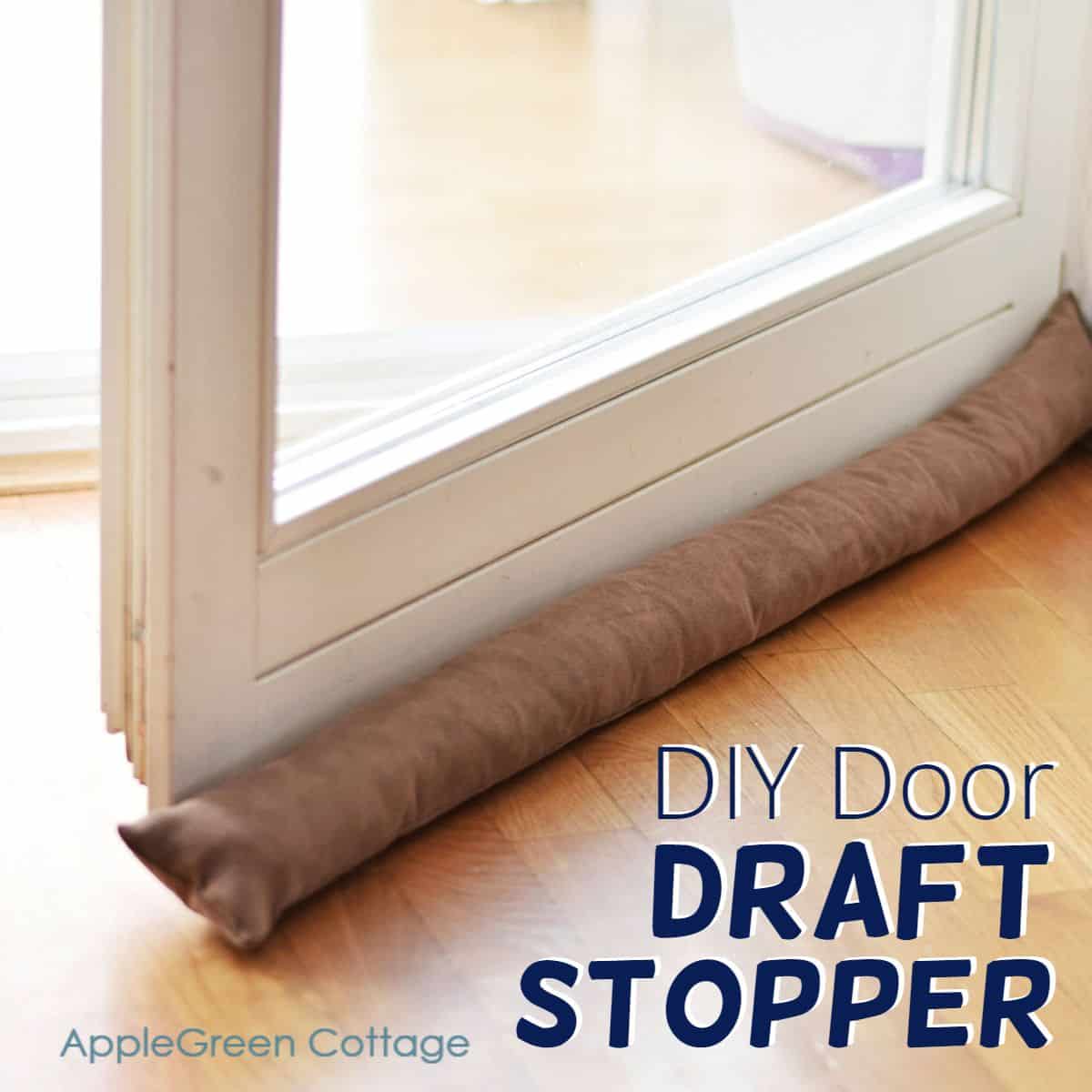 a finished faux leather door draft stopper placed under a balcony door