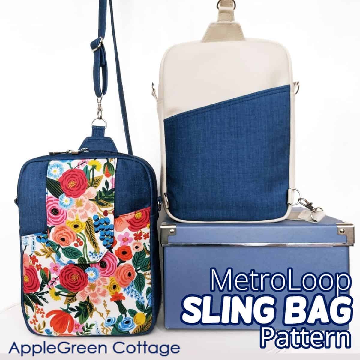 two finished handmade sling bags, one in deep blue and Rifle Paper floral print, with a flap pocket in the front and a crossbody strap attached, and a second bag shown from teh back side, with denim and beige faux leather on a blue box