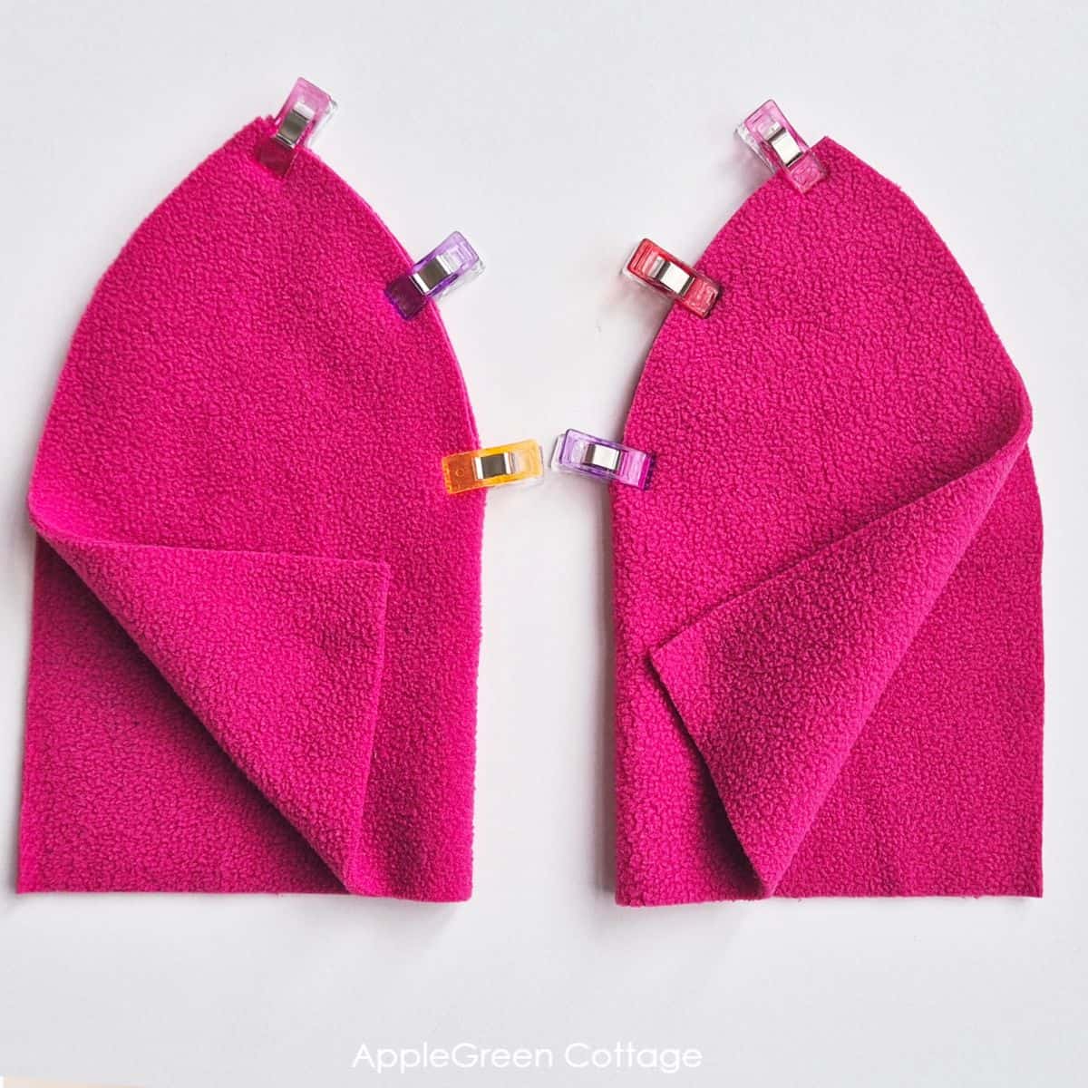 the top dart seams on a fleece hat, pinned for sewing 