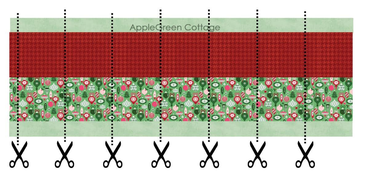 strip-pieced quilt block in vibrant reds and green holiday prints, ready to be cut