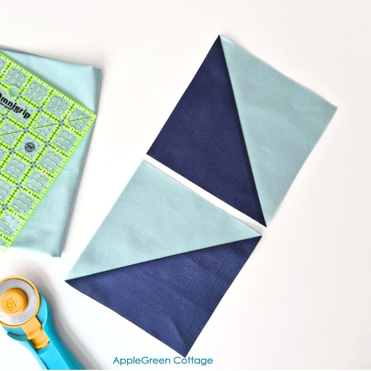 Two half-square triangle (HST) quilt blocks in light and dark fabric, trimmed to size, perfect for beginner-friendly quilting projects.