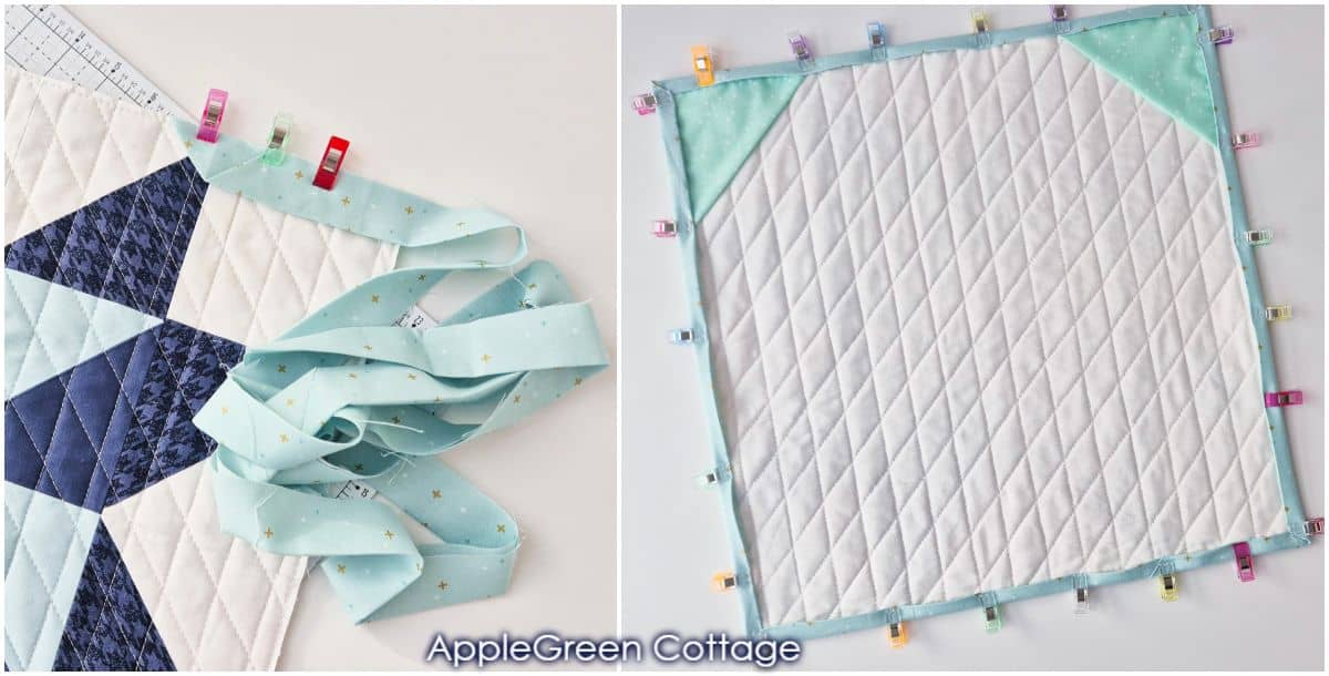 Fabric clips holding quilt binding in place before sewing, ensuring a neat and even finish.