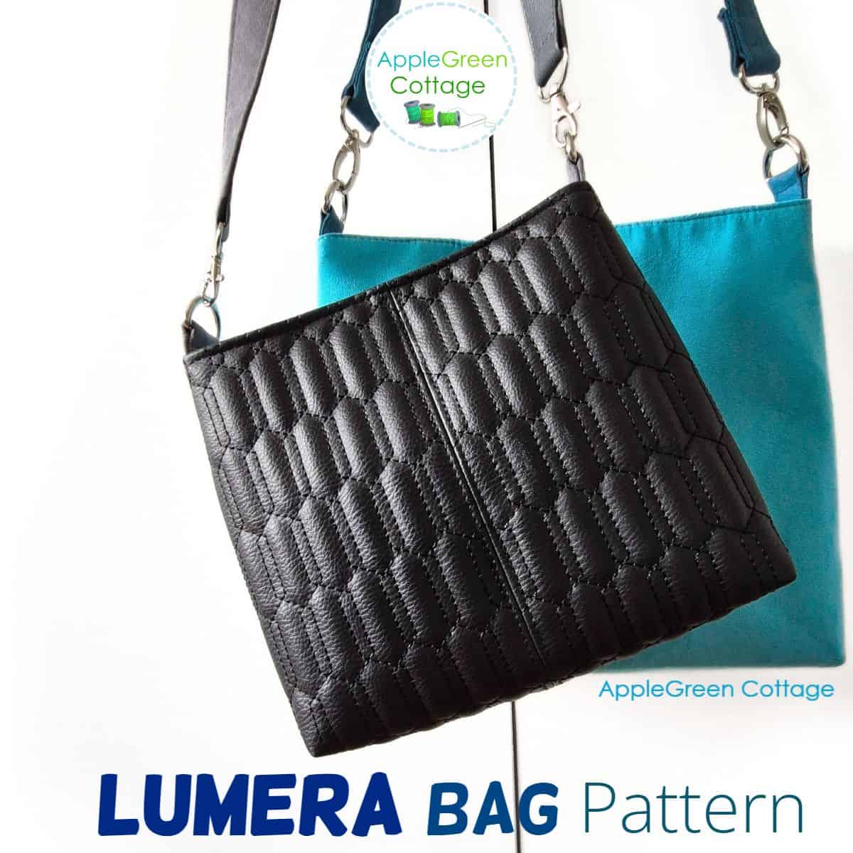 A beautiful handmade black faux leather bag hanging on a sleek faux leather shoulder strap.