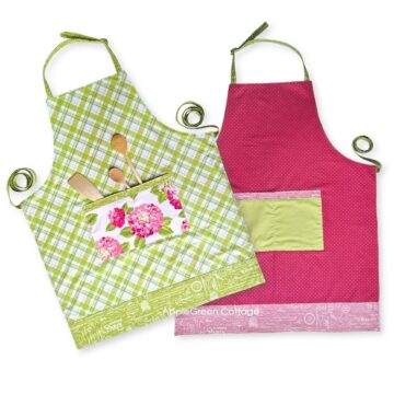 Two finished reversible aprons in adult and child sizes with adjustable neck strap and large double pockets.