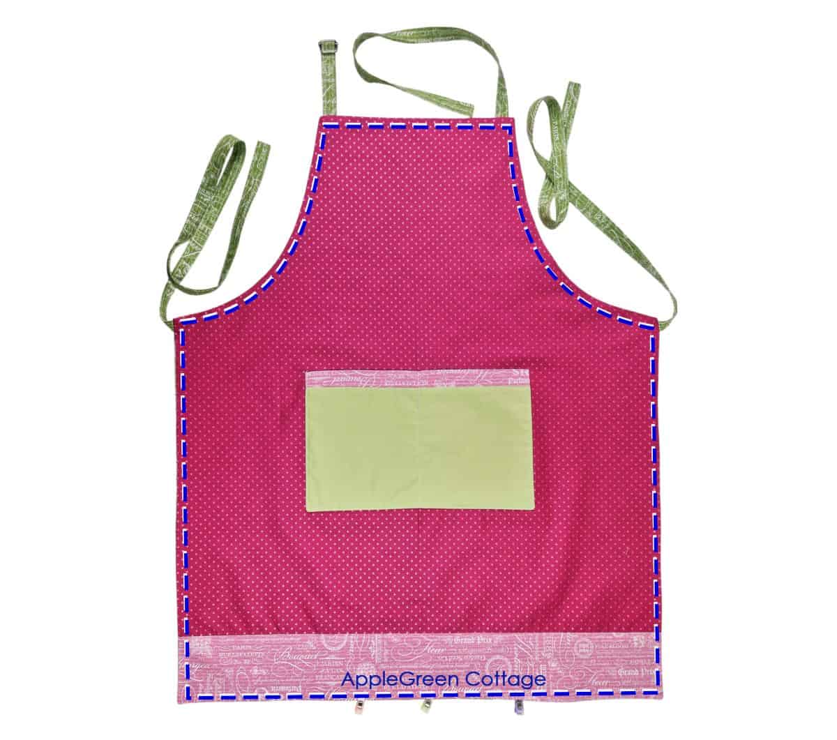 Finished reversible apron with adjustable neck strap and large front pocket