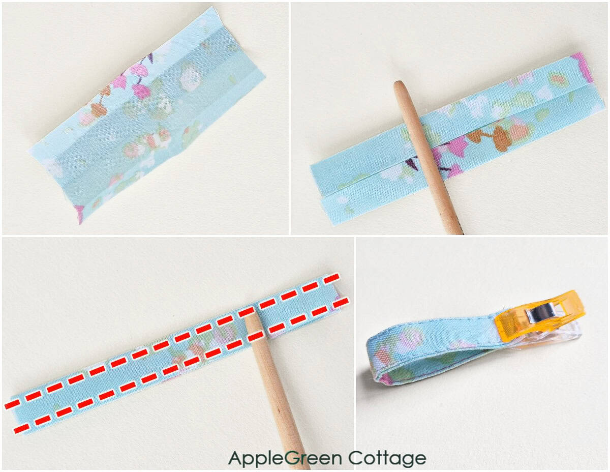 Fabric strip folded and pressed into a loop for potholder hanging tab sewing step.