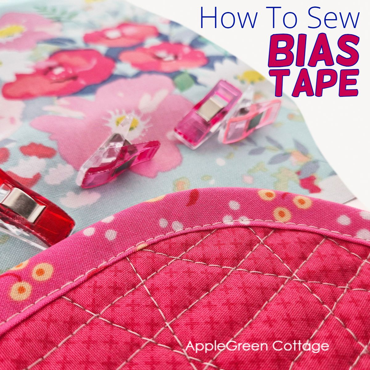 Finished quilt binding close-up with neat edge stitching and smooth curve.