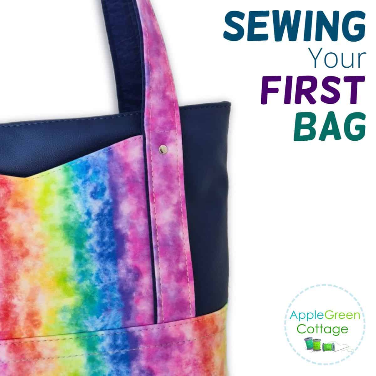 Colorful handmade tote bag with outer pocket and beginner bag sewing text.