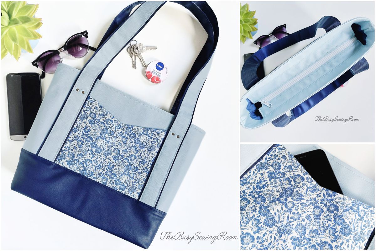 Light blue and navy handmade tote with blue floral front pocket and coordinating handles.